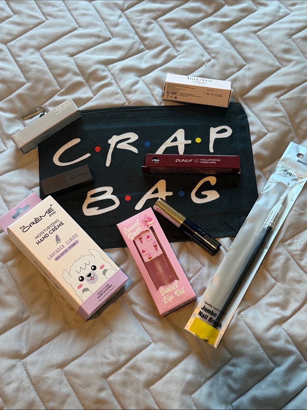 Black 'Crap Bag' Canvas Pouch filled with 8 makeup beauty items